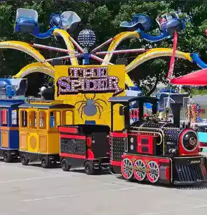 Commercial amusement ride rental Commercial amusement ride illuminated at an outdoor event