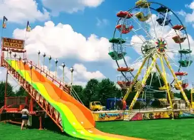 Big Round Wheel amusement ride rentals Big Round Wheel amusement rides set up for an outdoor event