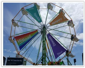 Full Ferris wheel fitted with multicolored HiRoad sponsor panels