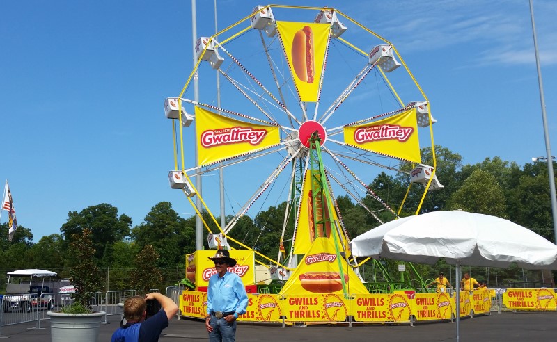 Corporate Sponsor Branding Example Custom sponsor branding displayed on a Big Round Wheel attraction